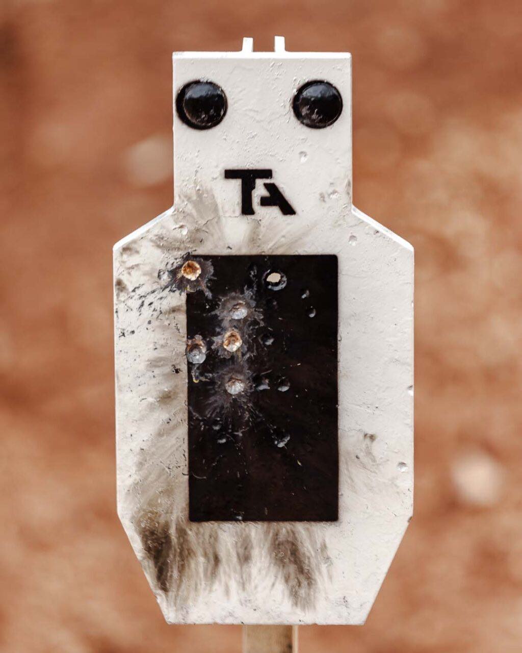 ere is the target plate after the two impacts of 300 winchester magnum armor piercing incendiary.