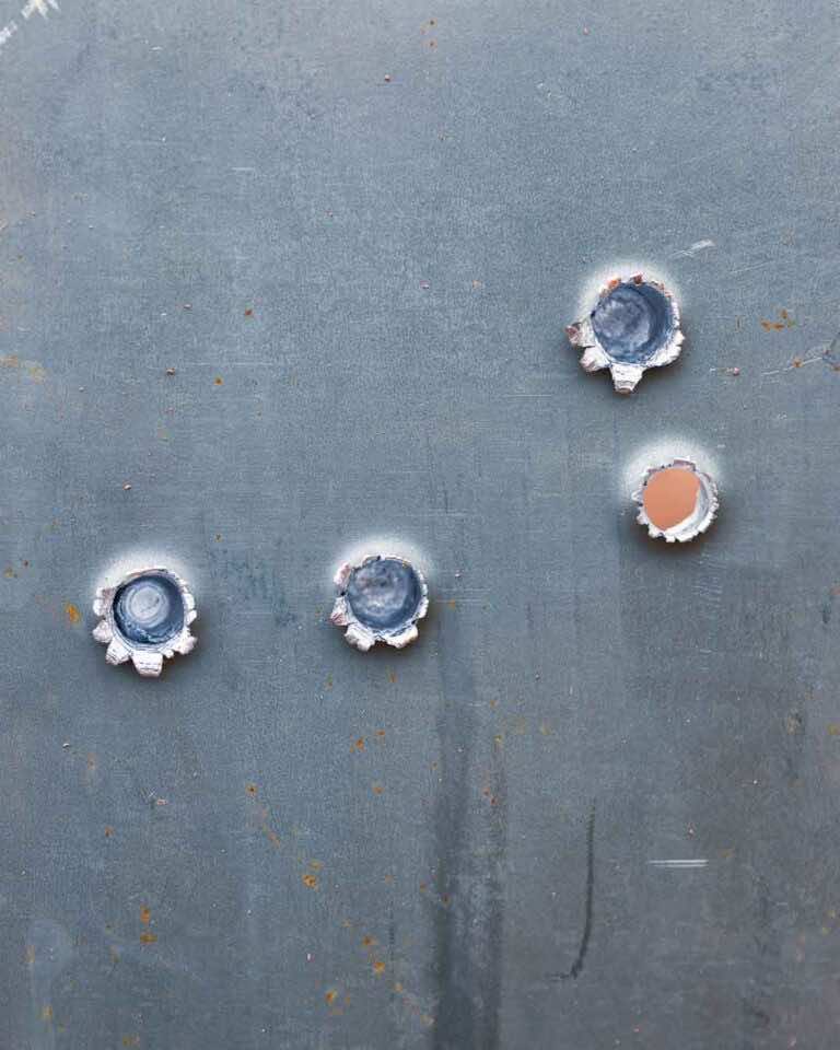 The impressions and holes in the Mild Steel Target