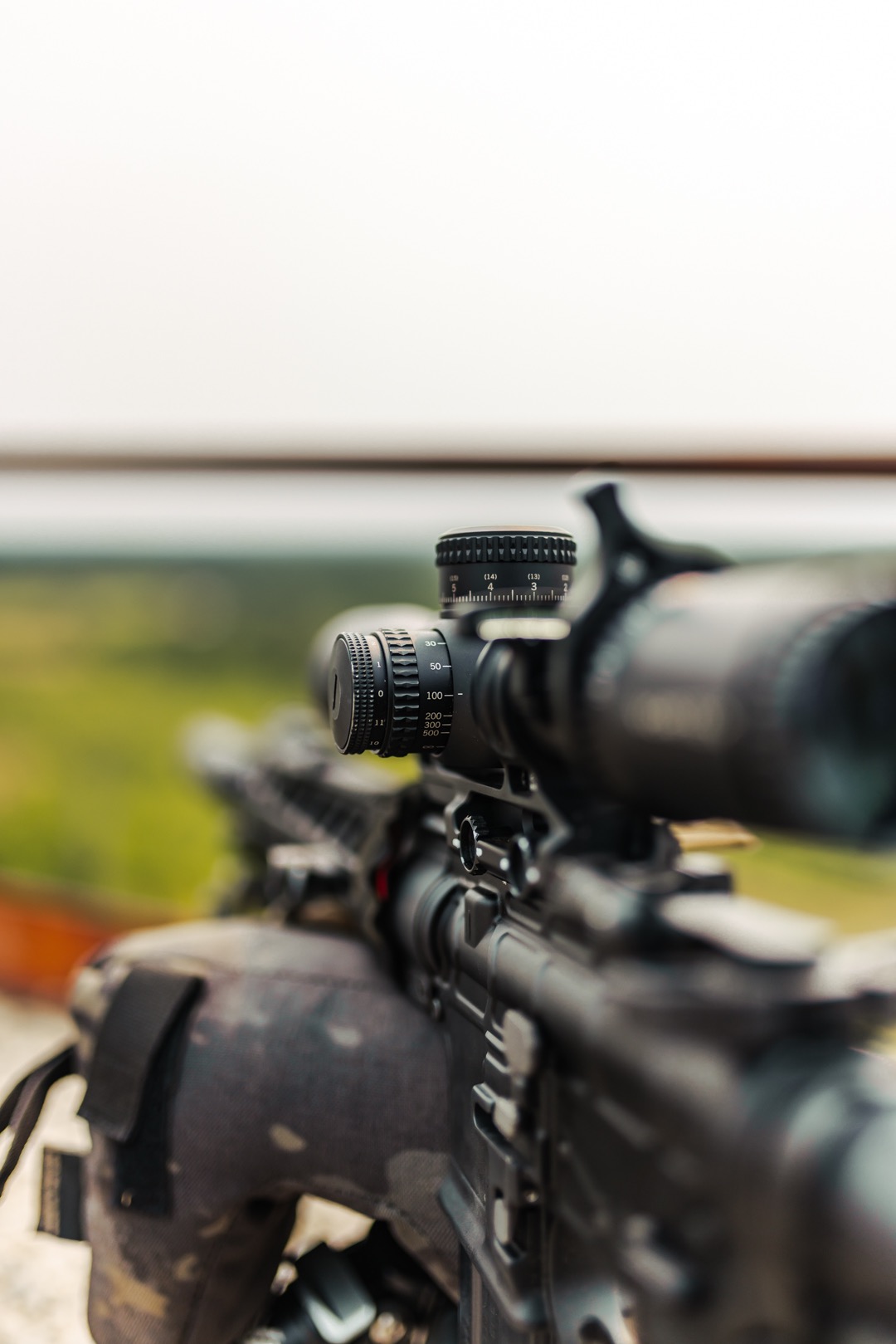 6MM ARC Sniper Rifle set on the edge of a building