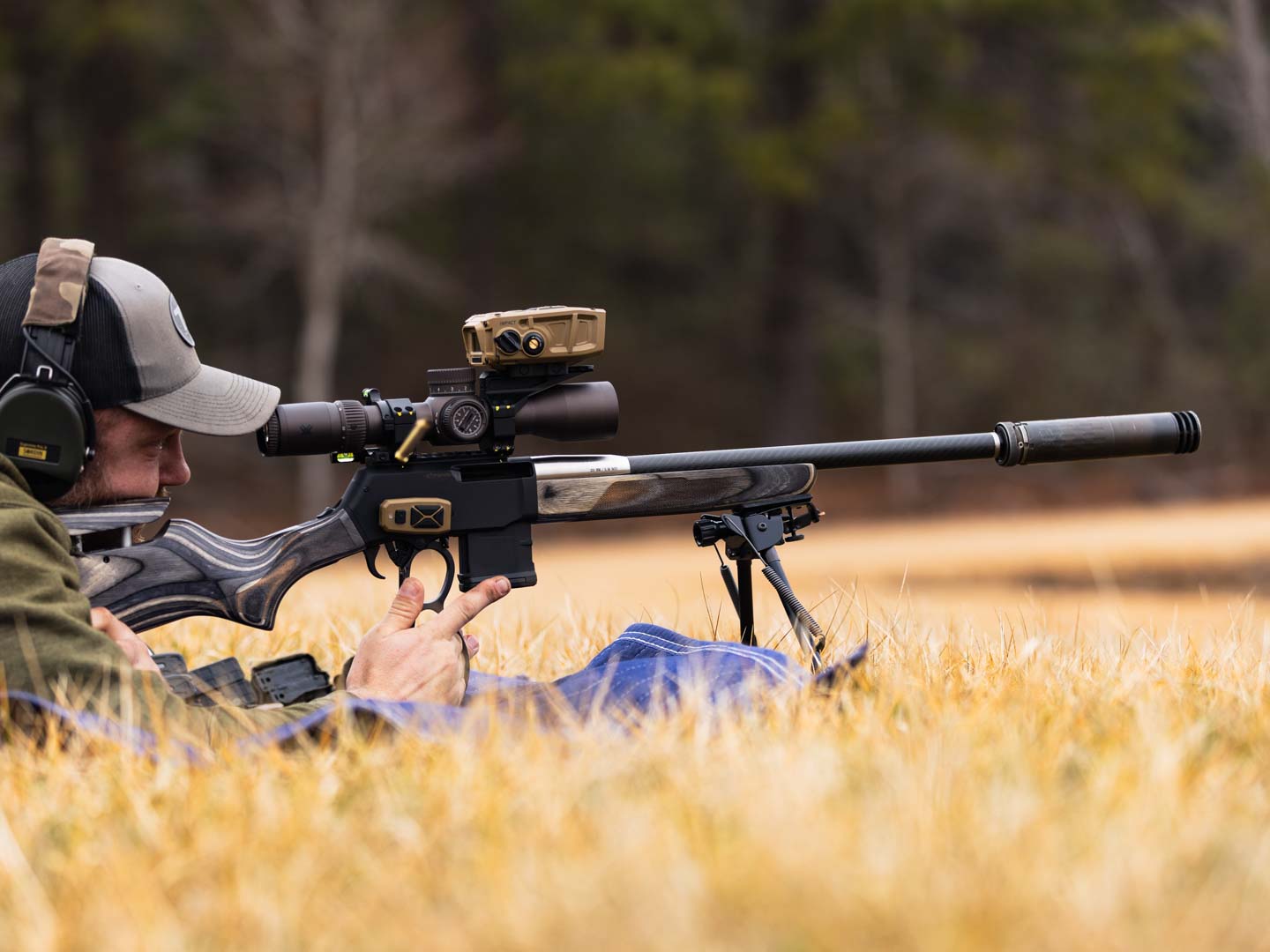 Jared shooting long range with his lever action rifle