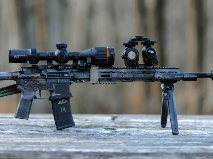 Weapon Mounted Night Vision with binos resting on the rifle Weapon Mounted Night Vision with binos resting on the rifle