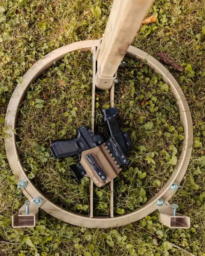 20" Round Base with a pistol a holster inside