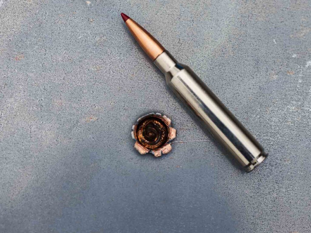 Bullet stuck in the mild steel target Bullet stuck in the mild steel target