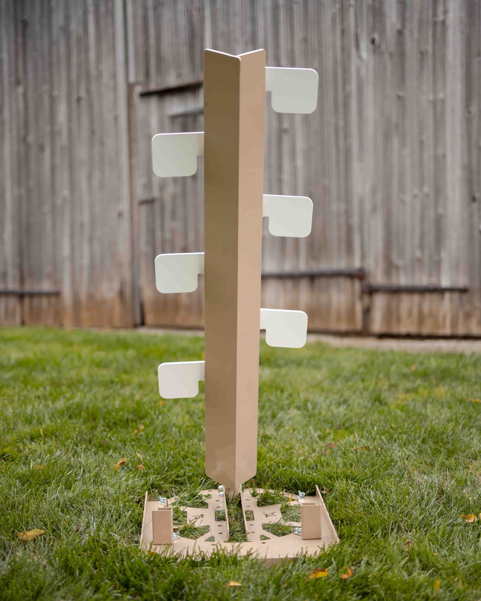Rifle dueling tree reactive steel target with white AR550 paddles that swing when hit